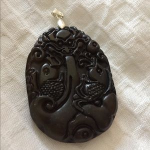 Sterling silver pendant necklace w carved stone